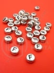 Мънисто 7х4мм метализе буква F отвор 1мм 1пак 100бр 318605